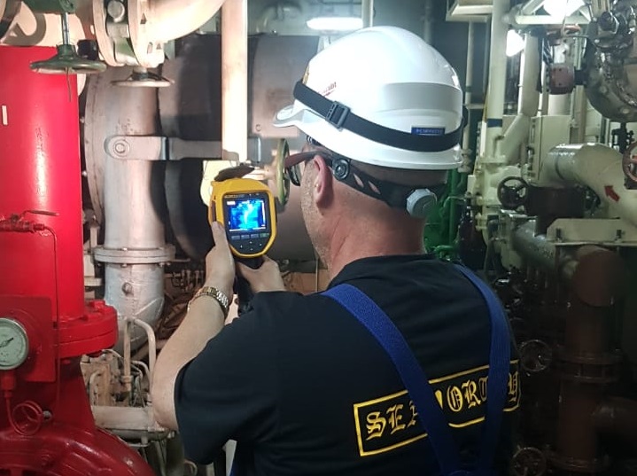 AL-QAQNOOS engineer performing thermal imaging survey in engine room