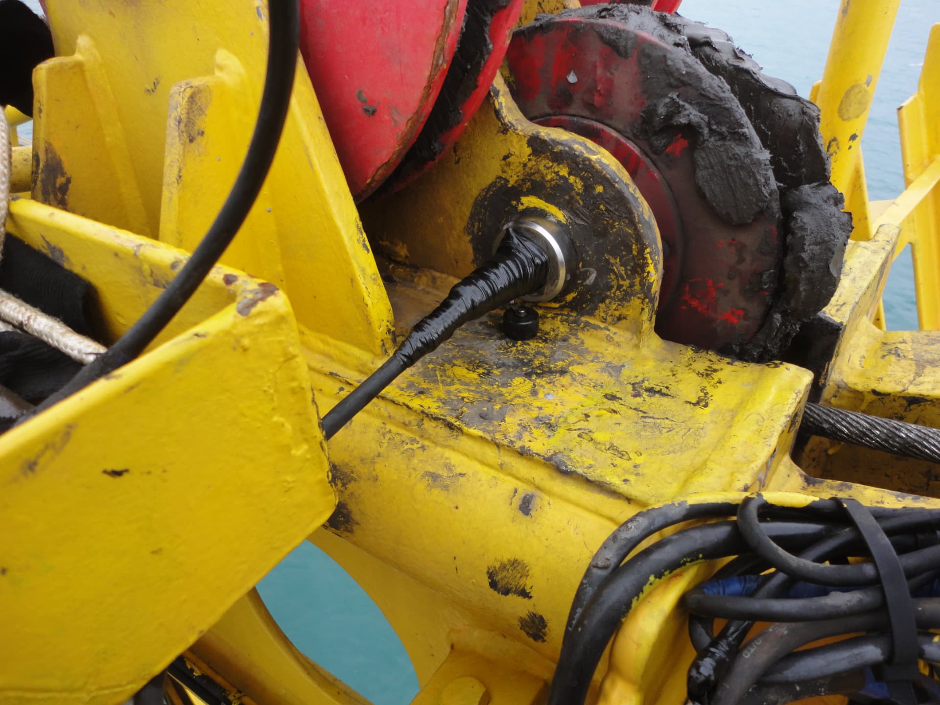 Crane sheave with wire-rope speed sensor and cable installation