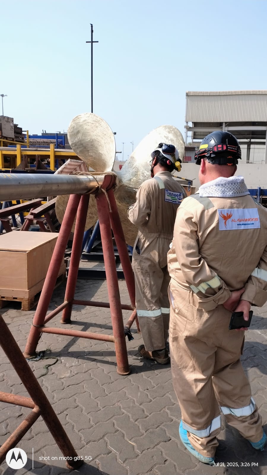 AL-QAQNOOS engineers inspecting a propeller shaft in shipyard