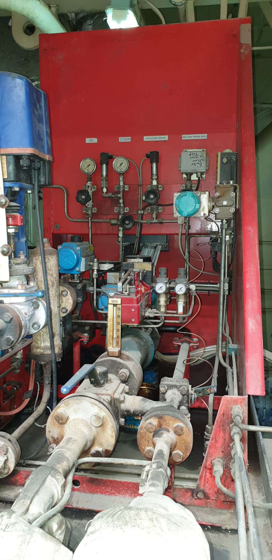 Auxiliary boiler control panel with steam and oil pressure instruments